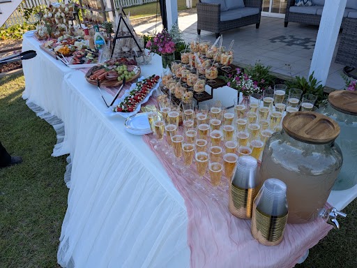 Luxury outdoor garden tea party event tablescape setup in Wilmington NC